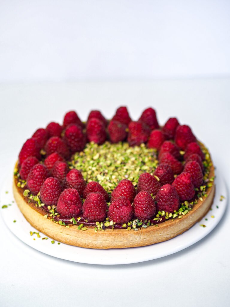 Crostata frangipane pistacchio e lamponi